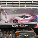 Pink diecast toy car in retail box with Power Rangers branding and figure