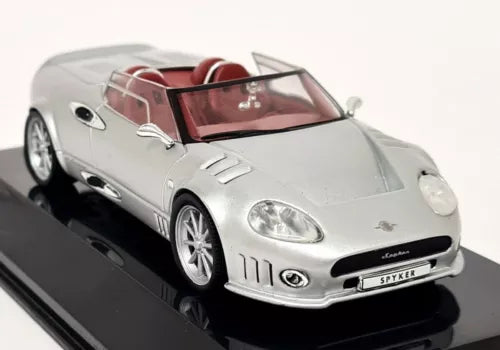 Silver Spyker C8 supercar diecast model with red interior and front headlights