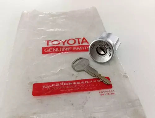 Toyota Genuine Parts key and lock cylinder in clear plastic bag with spare keys