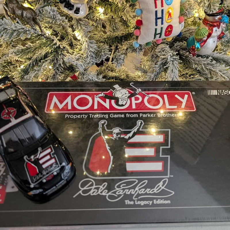 Monopoly Legacy Edition game box with diecast Monte Carlo race car
