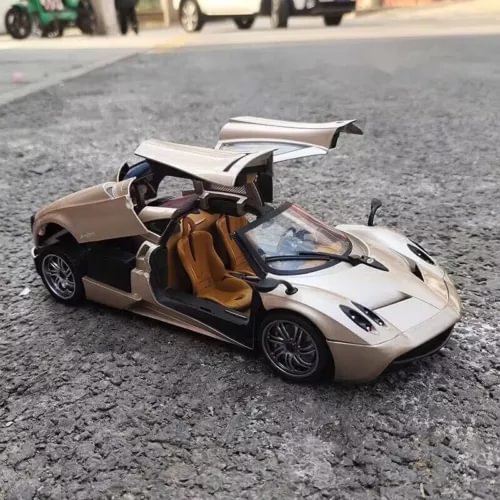 PAGANI HUAYRA 1:18 diecast car model with open doors and brown interior, silver body