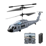 Gray mini drone helicopter with camera, rotor, and handheld controller