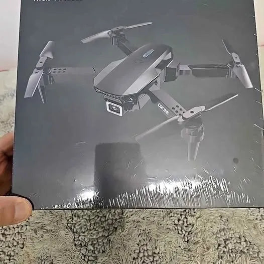 4K HD foldable drone with four propellers and camera module