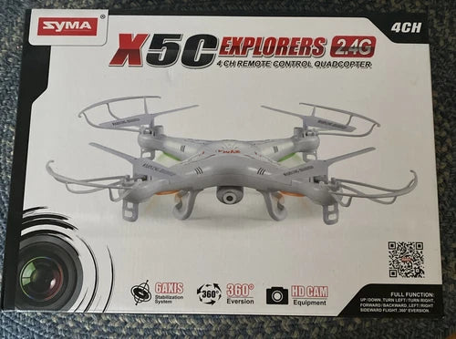 Syma X5C Explorers quadcopter drone, 4-channel remote control, printed on retail box