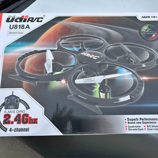 RC drone toy in retail box, quadcopter with 4-channel 2.4GHz controls