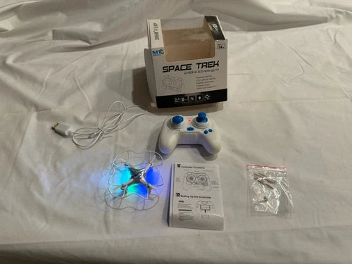 Flip drone kit with remote controller, USB cable, spare parts and instruction booklet