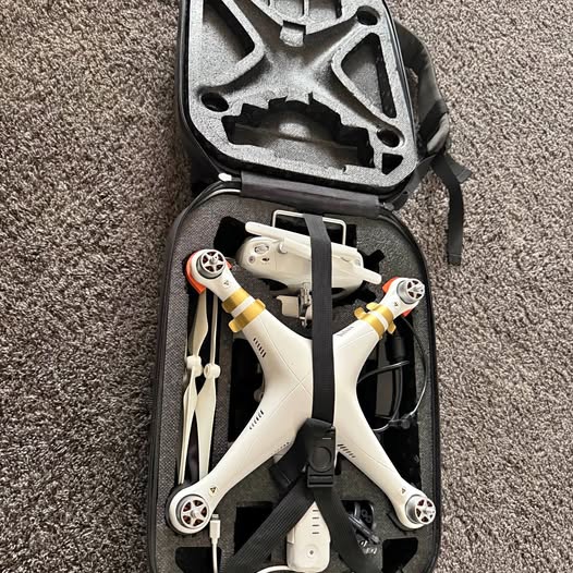 White DJI Phantom 3 Pro drone in carrying case