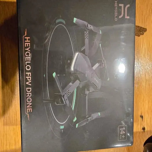 Drone retail box with illustrated quadcopter and front propeller arms