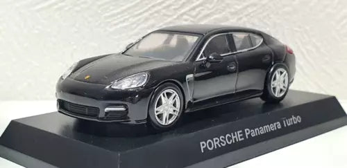 Black diecast Porsche Panamera Turbo car model on display base, front 3/4 view.