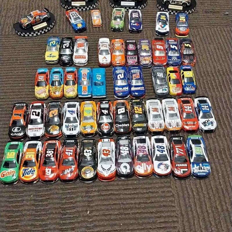 Set of NASCAR diecast race cars, assorted colors and numbers