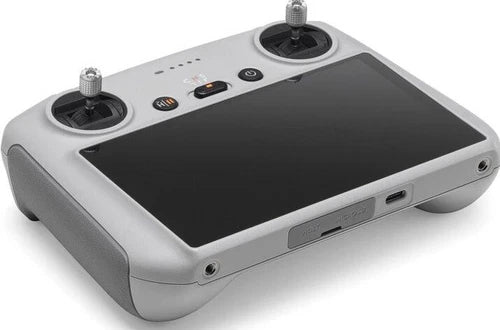 DJI RC Smart remote controller with built-in display, joysticks, and antenna