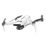 White quadcopter drone with 3-axis camera gimbal and foldable propellers
