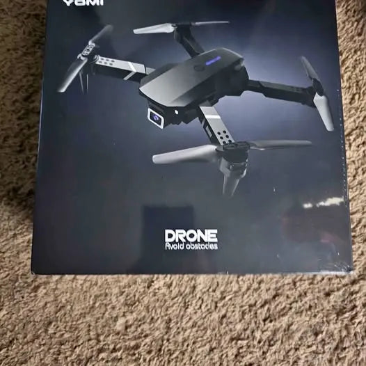 Drone Temple TX quadcopter on product box, four-propeller design illustration