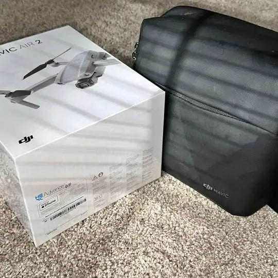 DJI Mavic Air 2 drone bundle box and black soft carrying case