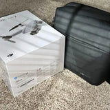 DJI Mavic Air 2 drone bundle box and black soft carrying case