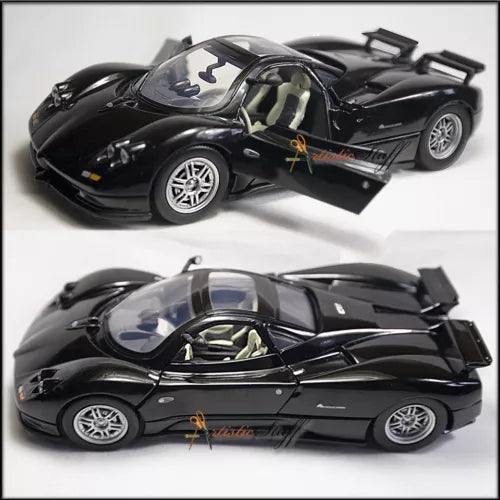 1:24 scale diecast model car in dark black, open cockpit detail, two-angle view