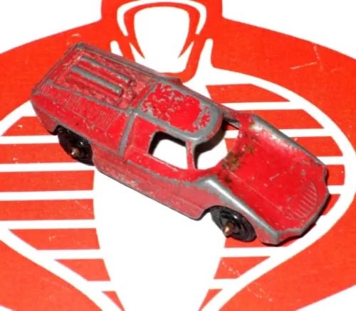 Red diecast race car model with detailed body and wheels
