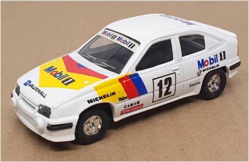White diecast rally car model with number 12 decals, Mobil 1 and MICHELIN logos.