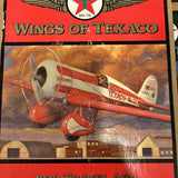 Diecast model plane in red and white with TEXACO lettering on the box