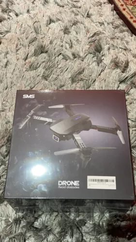 Foldable drone retail box with product photo and DRONE text