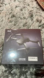 Foldable drone retail box with product photo and DRONE text