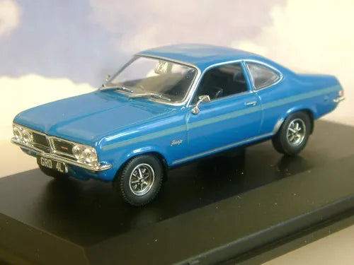 Blue diecast car model, front three-quarter view with chrome grille and headlights