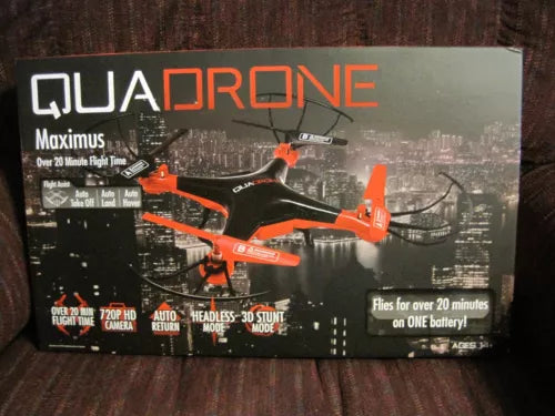 Orange and black quadcopter drone box with 720P HD camera graphics