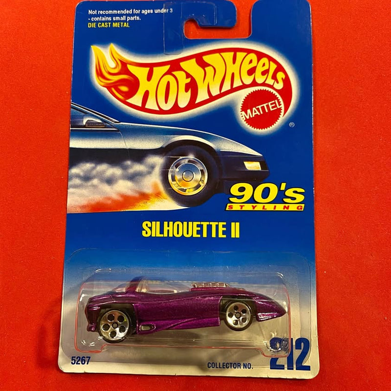 Hot Wheels purple Silhouette II diecast sports car, collector No. 12 on card