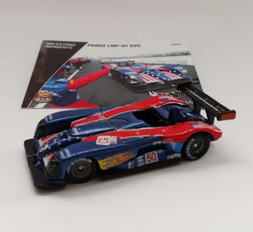 Red, blue and black race car diecast toy with rear wing and front splitter