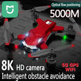 Red and gray quadcopter drone with front camera module and four propellers