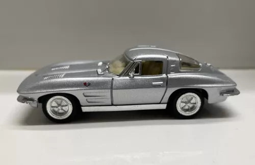 Silver 1:36 diecast Corvette Stingray toy car with detailed side profile and wheels