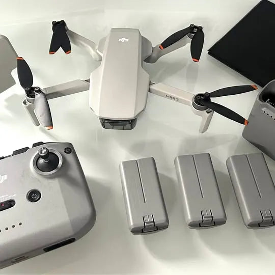 DJI Mini 2 drone, remote controller, and three batteries