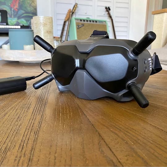 DJI V2 goggles in dark gray with two front antennas