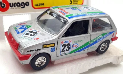 1/24 scale diecast race car with silver body, red trim, and number 23 decals