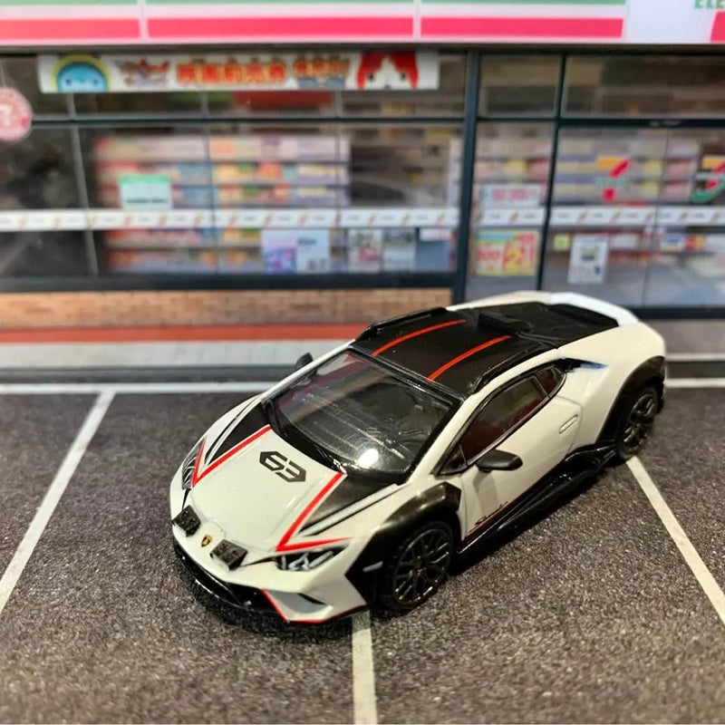 1:64 scale Lamborghini Huracan Sterrato diecast model car, white with black and red trim