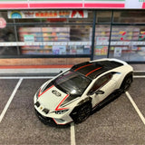 1:64 scale Lamborghini Huracan Sterrato diecast model car, white with black and red trim
