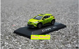 Green Toyota C-HR diecast model car on black display base with C-HR logo