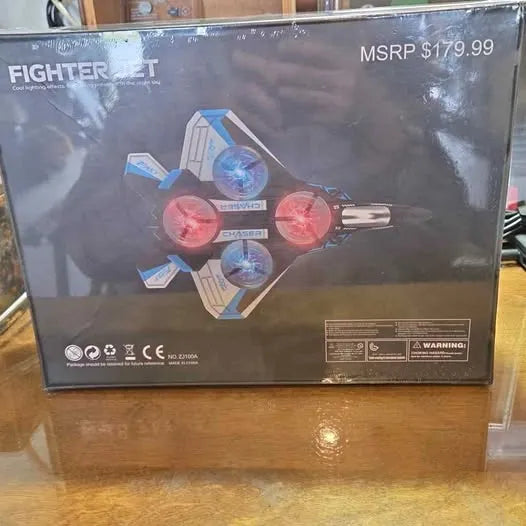 Fighter jet drone retail box with blue and pink aircraft graphic on front