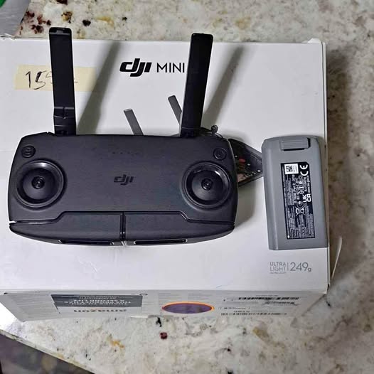 DJI Mini drone with remote controller and intelligent battery, black