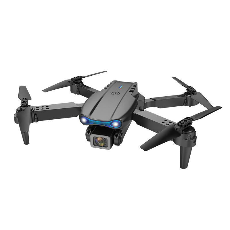 Mini quadcopter drone with 4 propellers, front camera, and blue LED lights