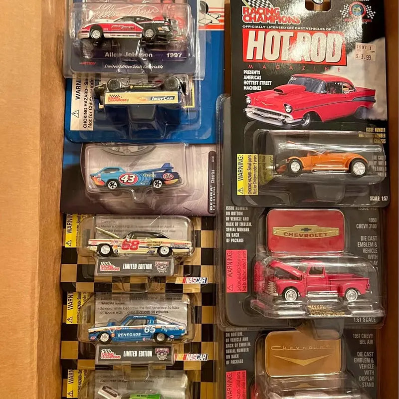 Diecast toy car multipack in blister packaging, assorted racing cars