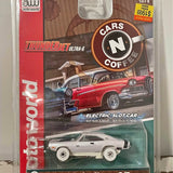 White diecast model car in clear blister packaging, black wheels and accents