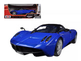 1/18 scale diecast sports car model, blue with black hood, front 3/4 view by Motormax