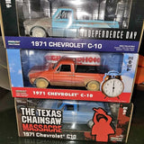 Orange 1971 Chevrolet C-10 diecast pickup model in retail box with clock graphics