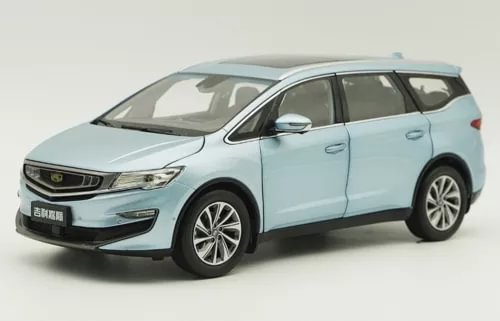 Light blue diecast MPV car model with detailed front grille and alloy wheels