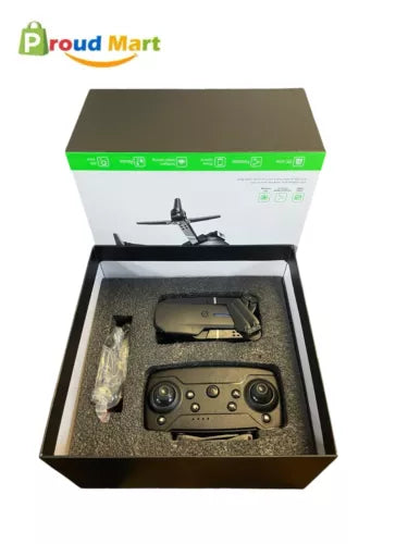 Compact foldable 2K camera drone with remote in open gift box