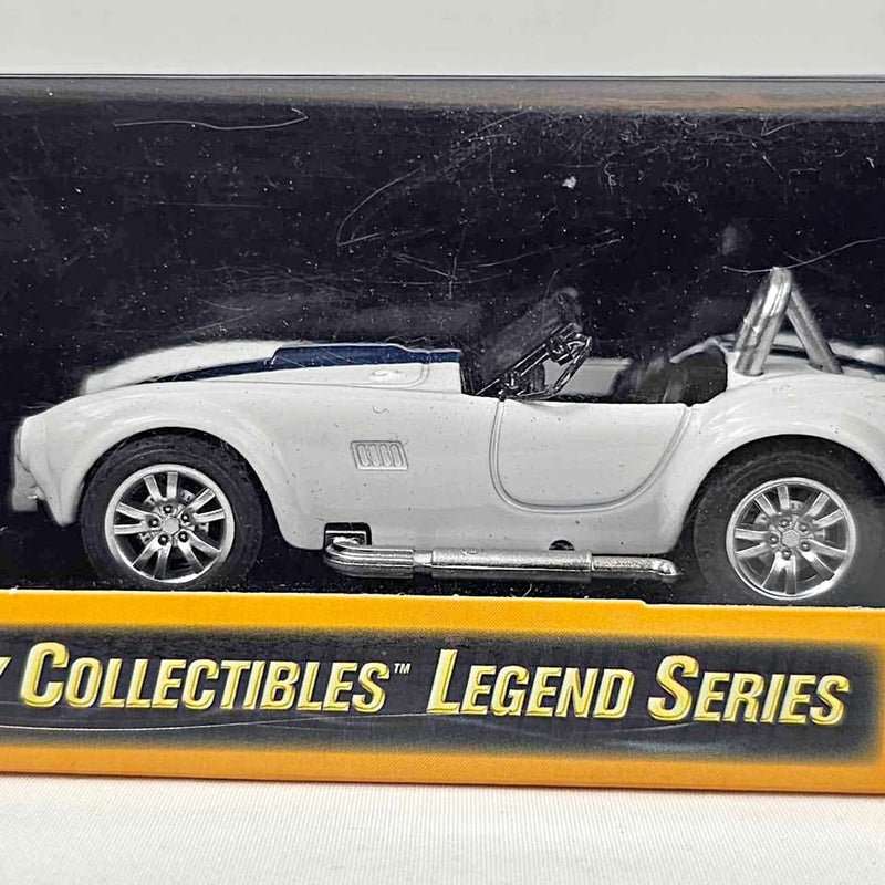 White Shelby Cobra 427 S/C diecast car, 1:43 scale, side view
