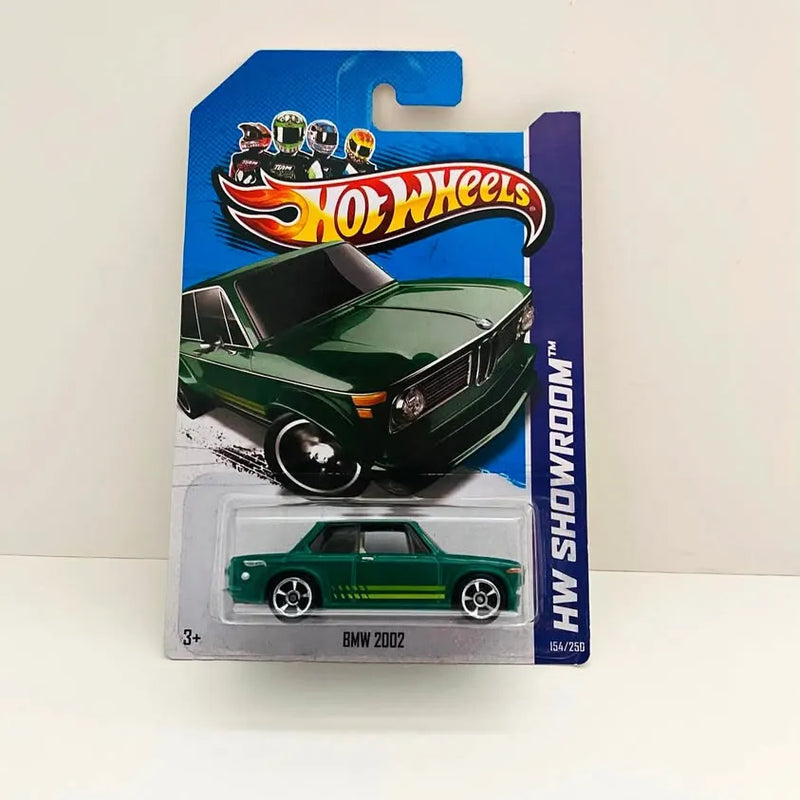 Green diecast BMW 2002 car toy in HW Showroom blister pack.