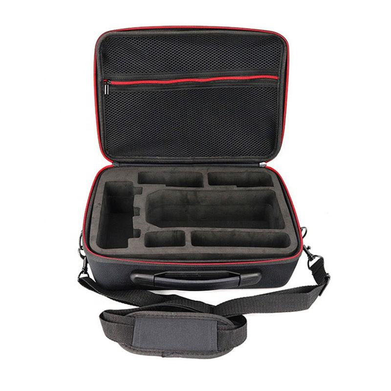 Portable hard-shell drone storage bag in black with red trim, open foam compartments and zipper