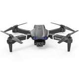 Quadcopter drone with four propellers, front camera, and gray body